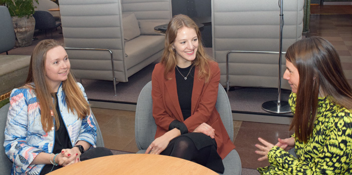 Three colleagues around a table